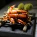 cooked prawns on bamboo stick